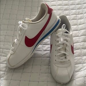 Nike White Sneakers with Red and Blue Accents